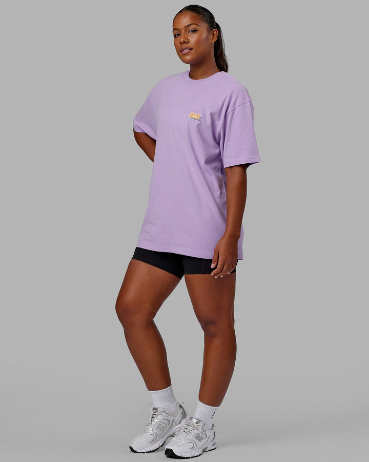 Woman wearing Unisex Radiate Heavyweight Tee Oversize - Pale Lilac