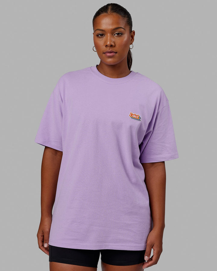 Woman wearing Unisex Radiate Heavyweight Tee Oversize - Pale Lilac