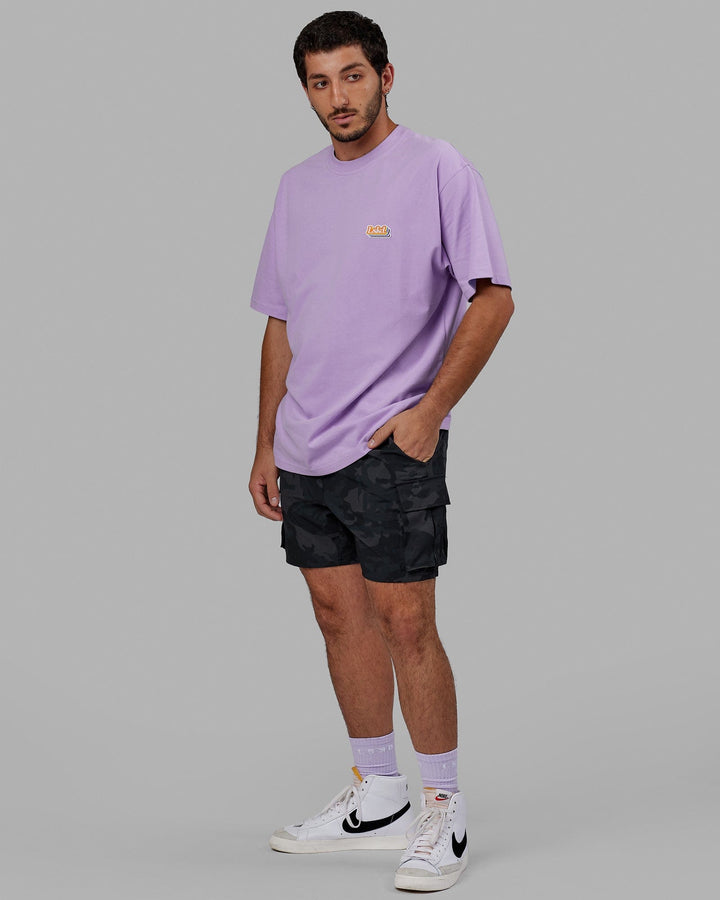 Man wearing Unisex Radiate Heavyweight Tee Oversize - Pale Lilac