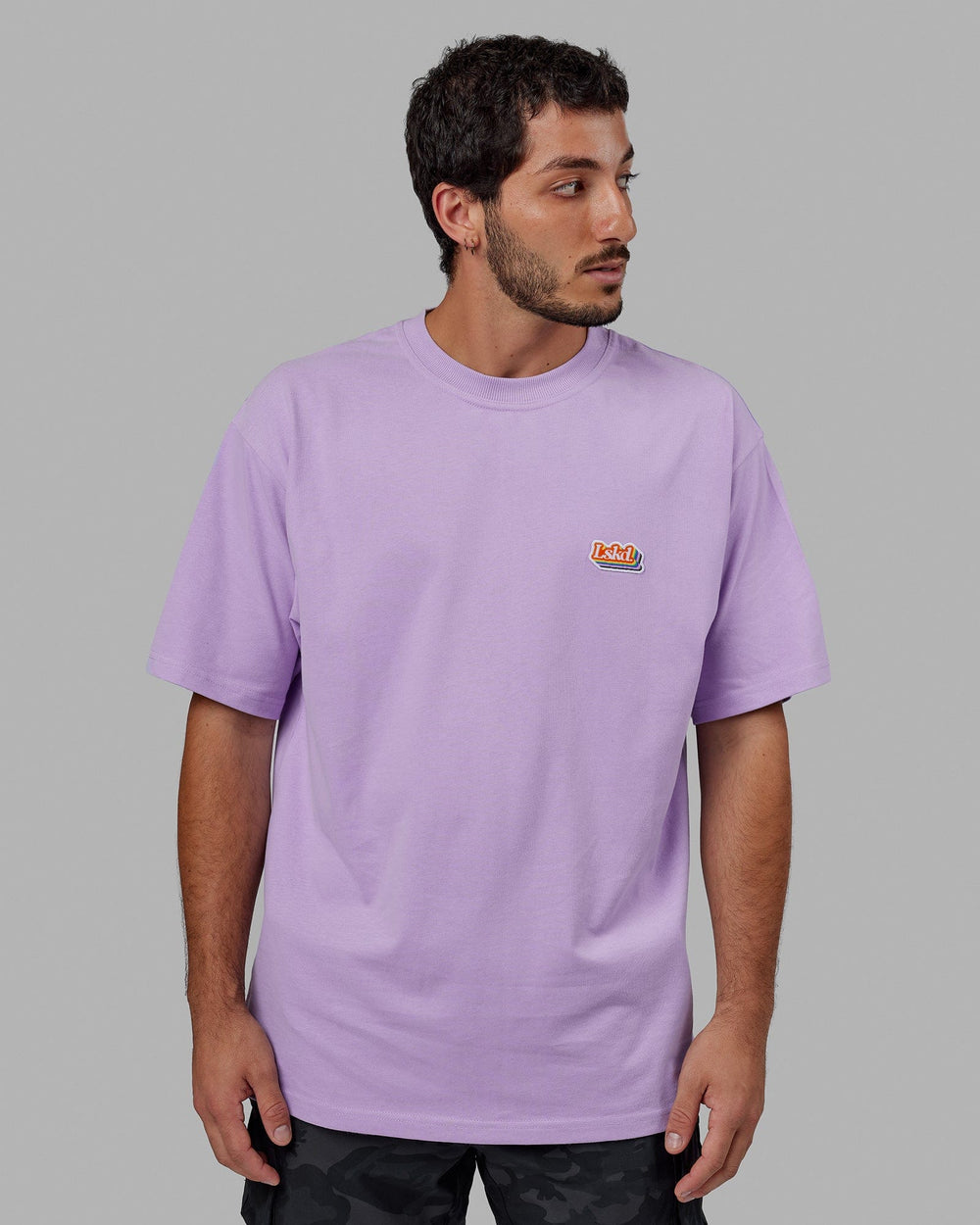 Man wearing Unisex Radiate Heavyweight Tee Oversize - Pale Lilac