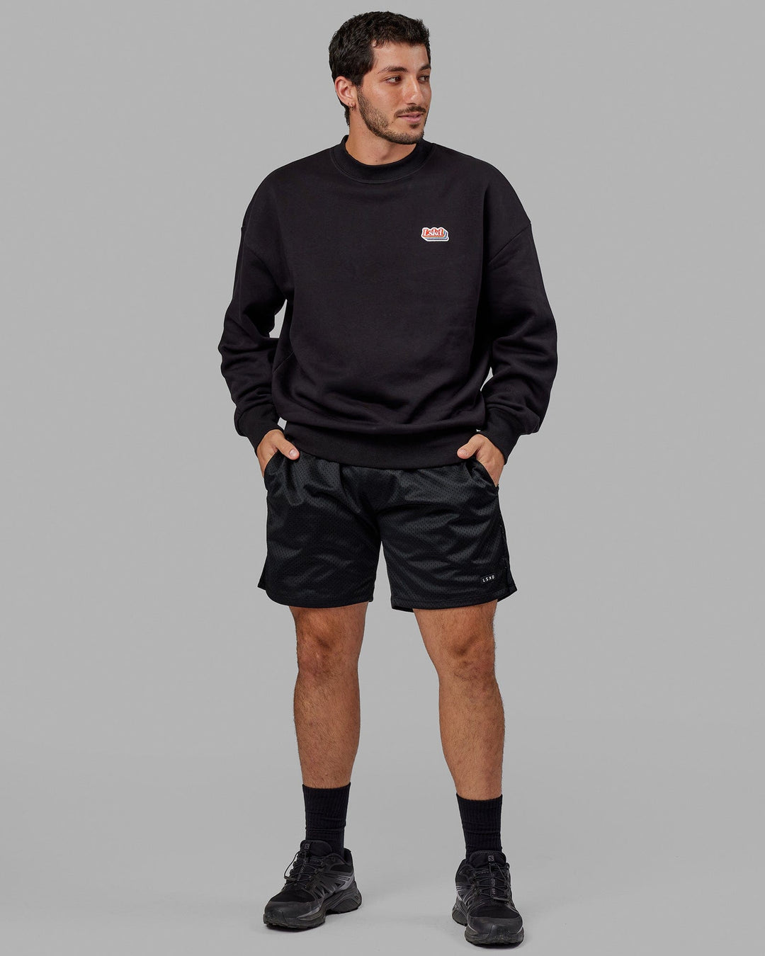 Man wearing Unisex Radiate Sweater Oversize - Black
