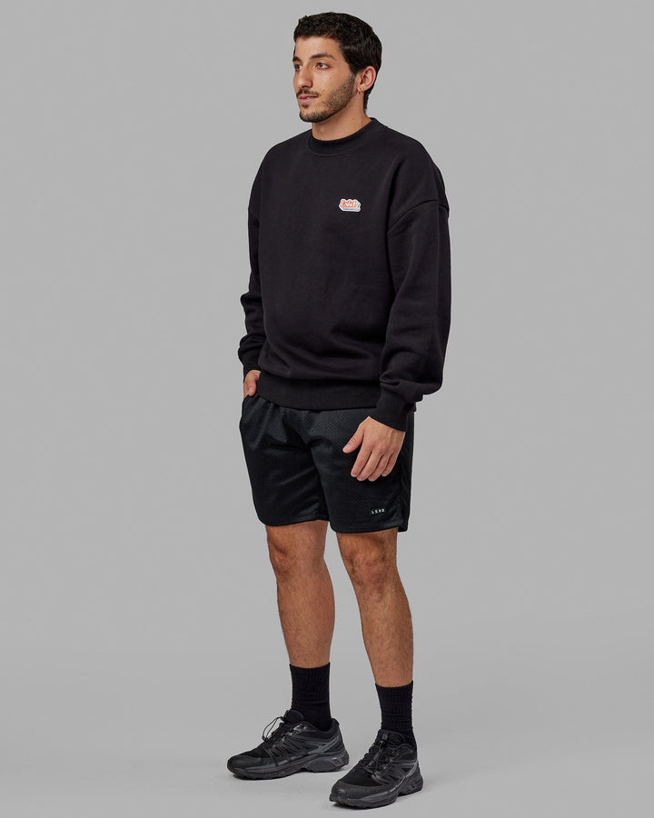 Man wearing Unisex Radiate Sweater Oversize - Black