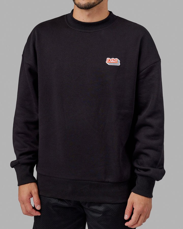 Man wearing Unisex Radiate Sweater Oversize - Black