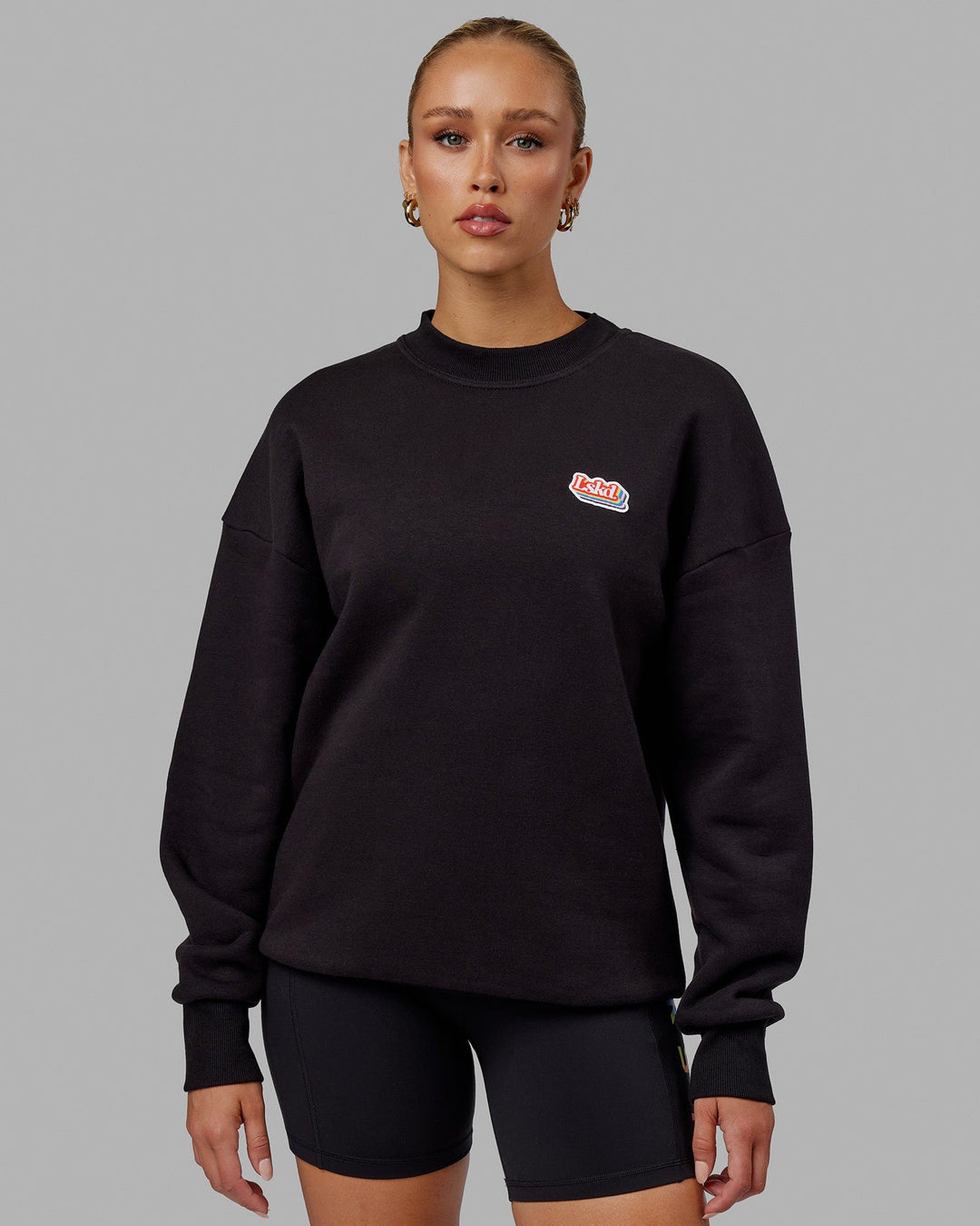 Woman wearing Unisex Radiate Sweater Oversize - Black