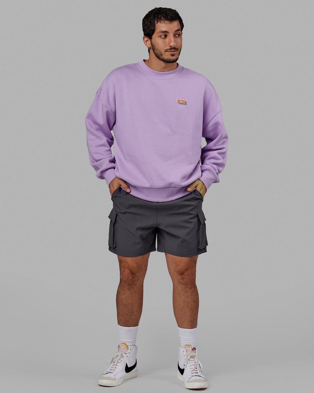 Man wearing Unisex Radiate Sweater Oversize - Pale Lilac