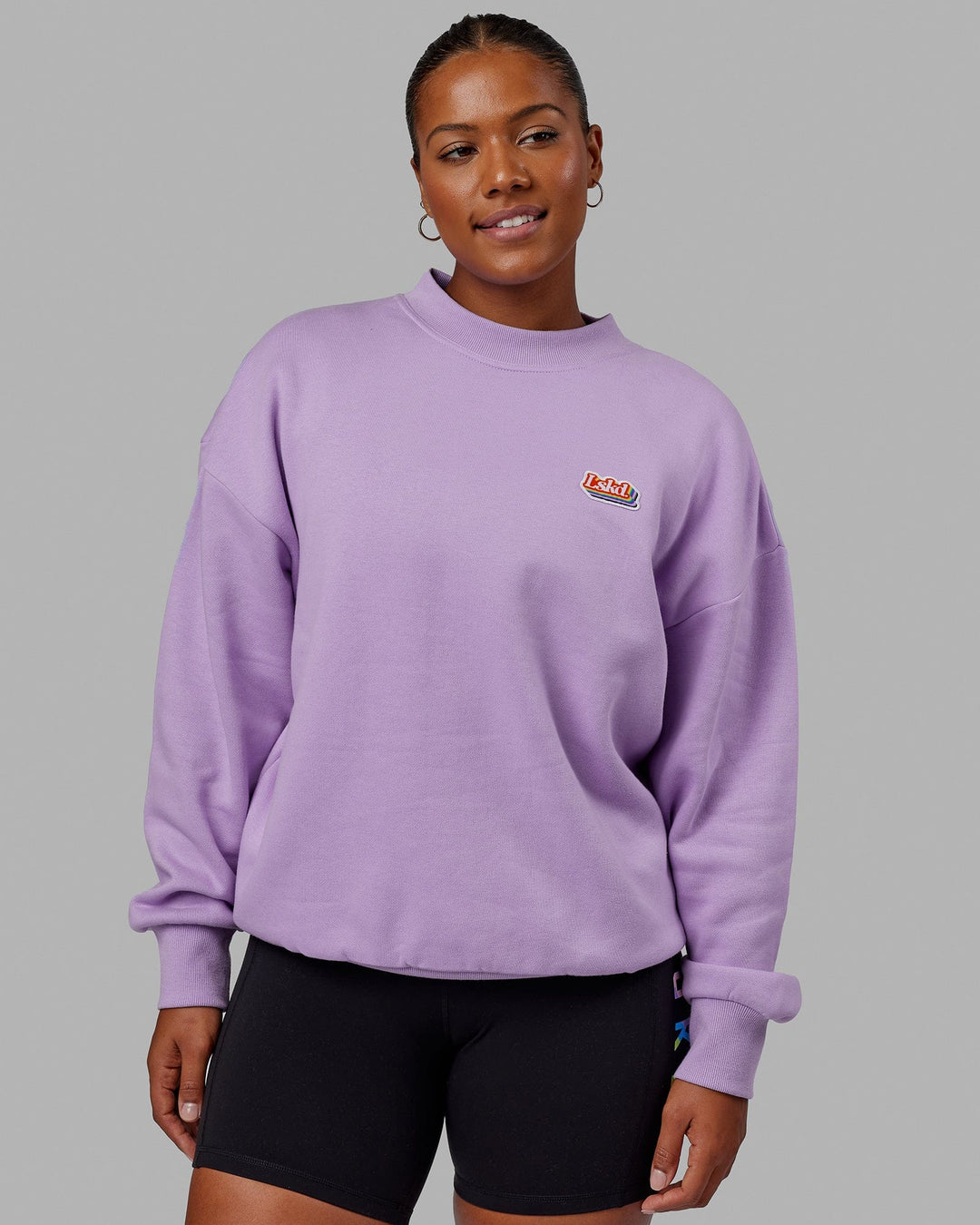 Woman wearing Unisex Radiate Sweater Oversize - Pale Lilac