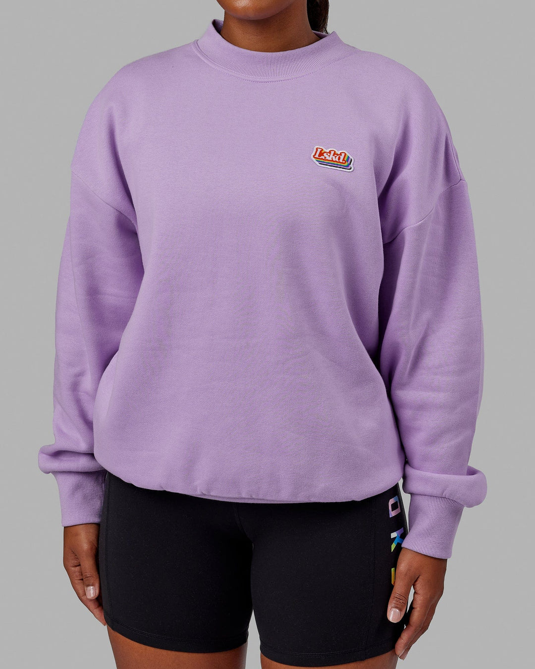 Woman wearing Unisex Radiate Sweater Oversize - Pale Lilac