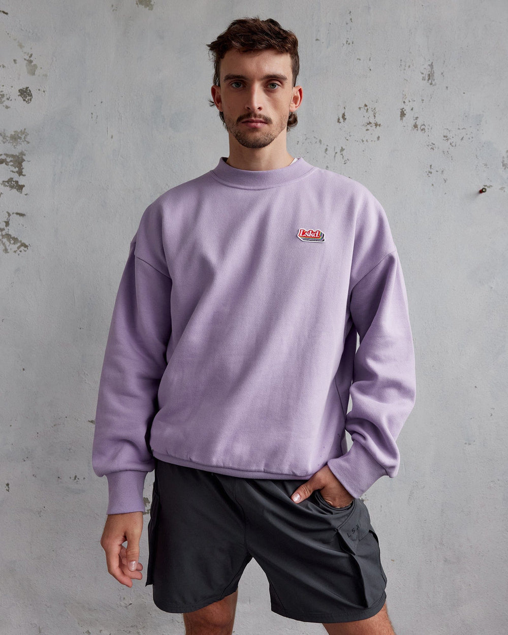 Man wearing Unisex Radiate Sweater Oversize - Pale Lilac