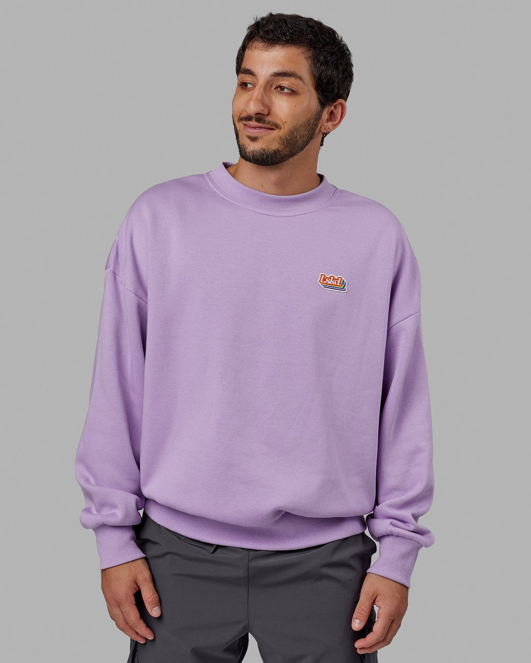 Man wearing Unisex Radiate Sweater Oversize - Pale Lilac