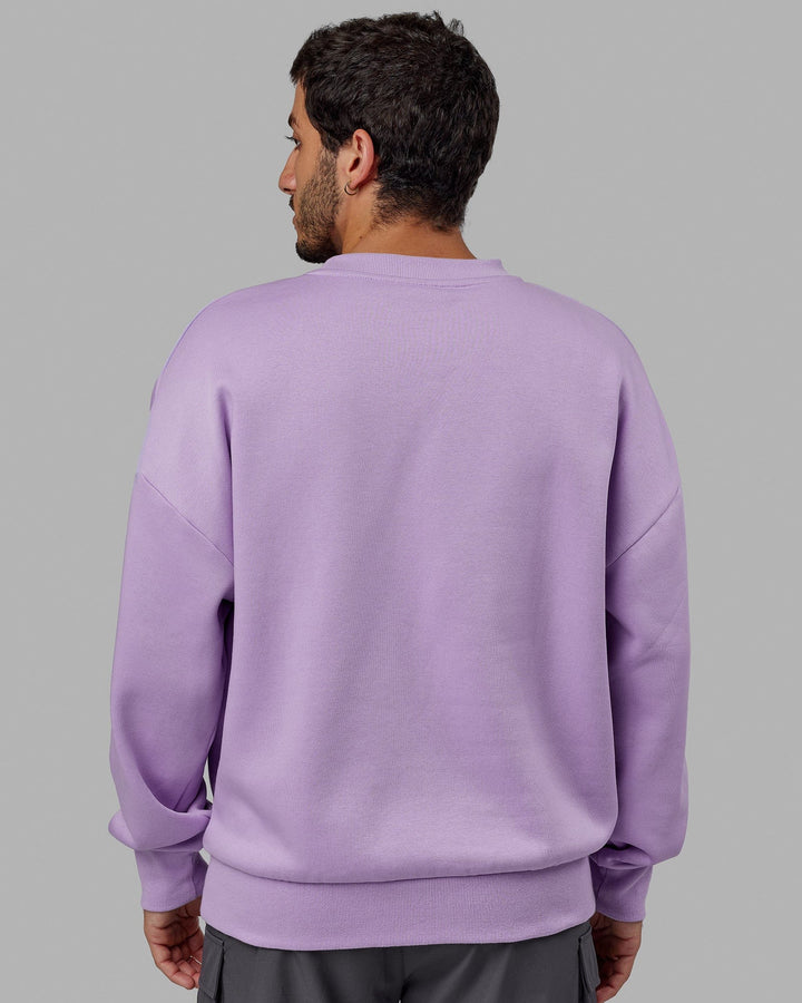 Man wearing Unisex Radiate Sweater Oversize - Pale Lilac