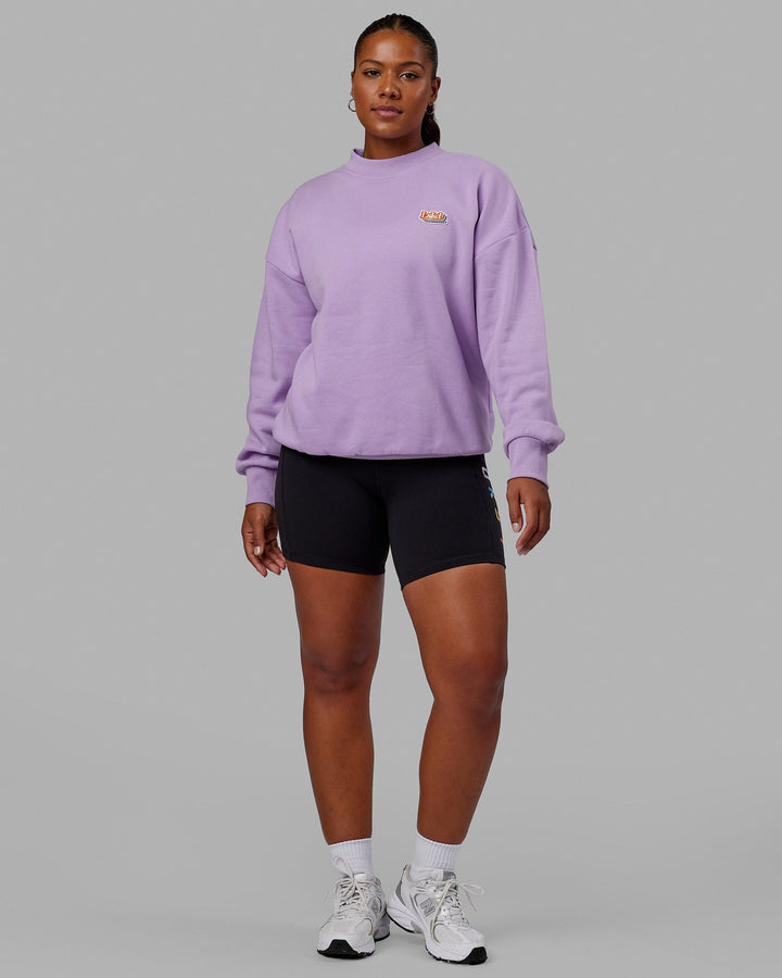 Woman wearing Unisex Radiate Sweater Oversize - Pale Lilac