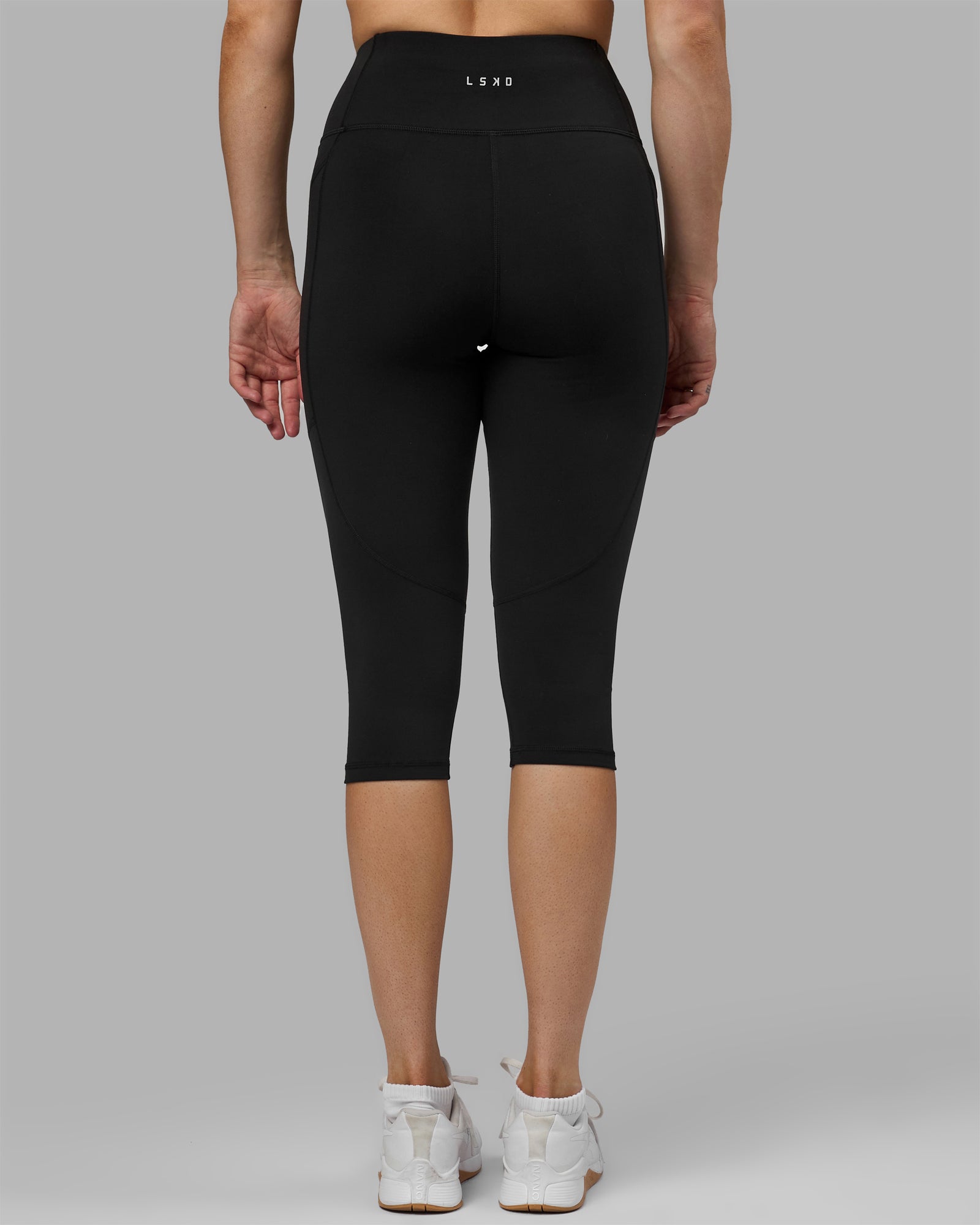 Woman wearing Rep Ultra High-Rise 3/4 Legging Pockets - Black-Black | Model:Hannah | Size:S