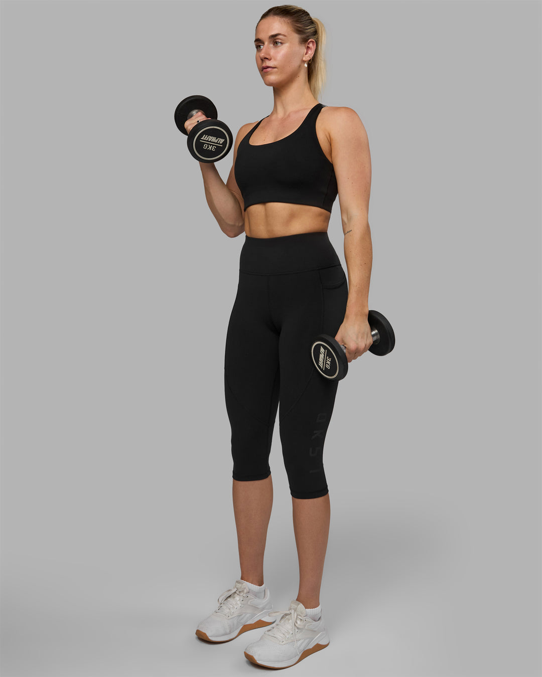 Woman wearing Rep Ultra High-Rise 3/4 Legging Pockets - Black-Black | Model:Hannah | Size:S
