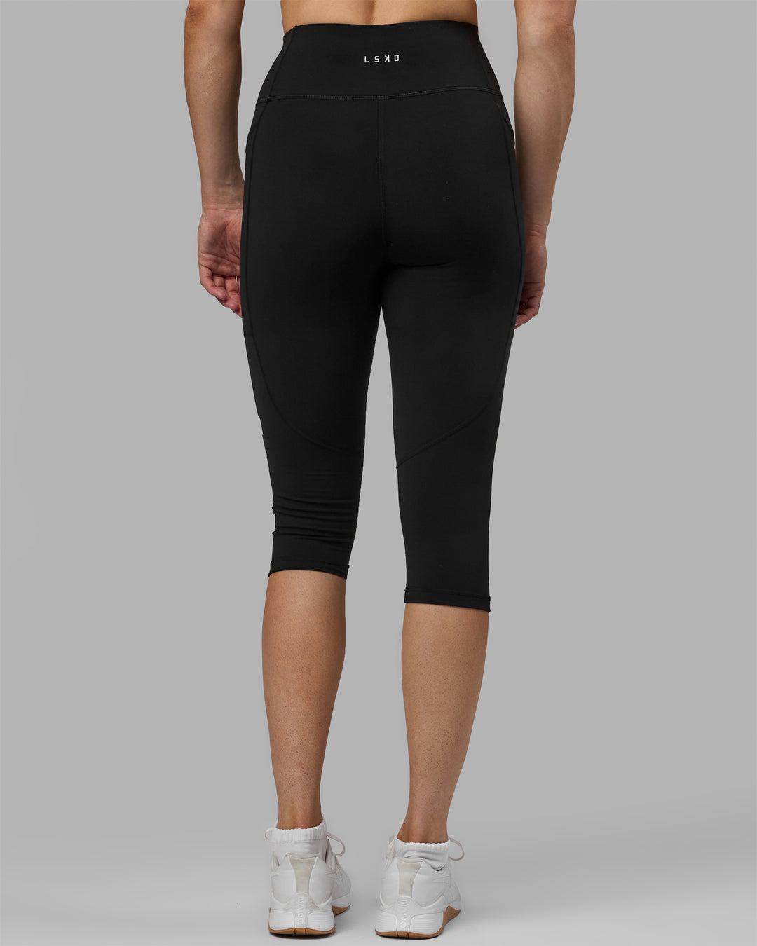 Woman wearing Rep Ultra High-Rise 3/4 Legging Pockets - Black-White | Model:Hannah | Size:S