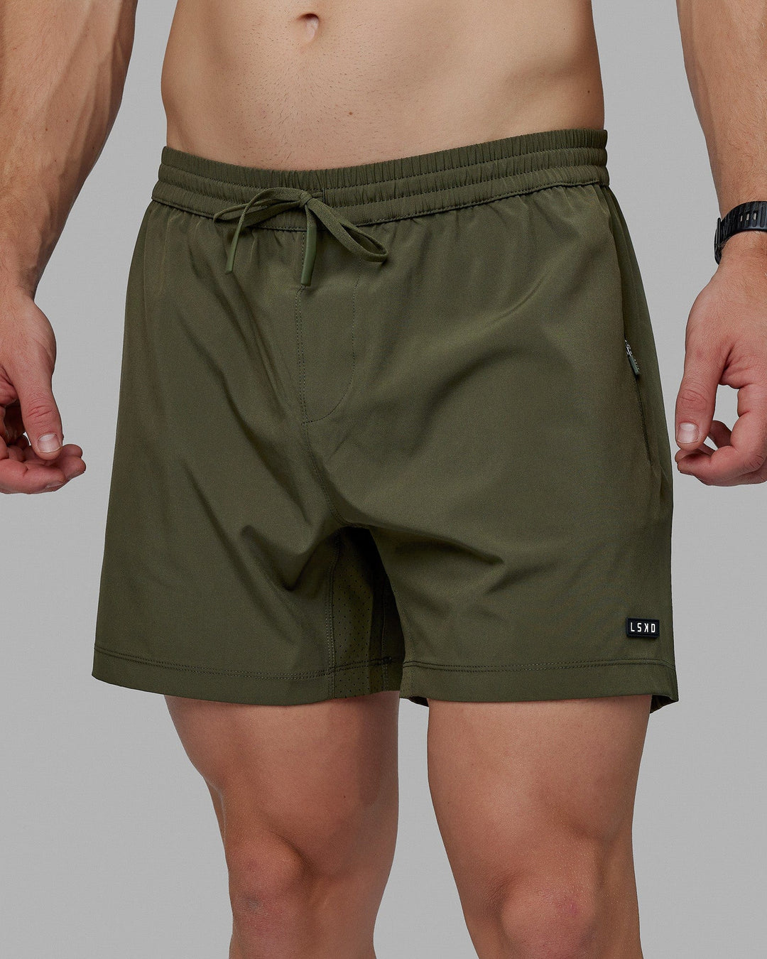 Man wearing Rep 5" Lined Performance Short - Forest Night