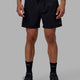 Man wearing Rep 5" Performance Short - Black