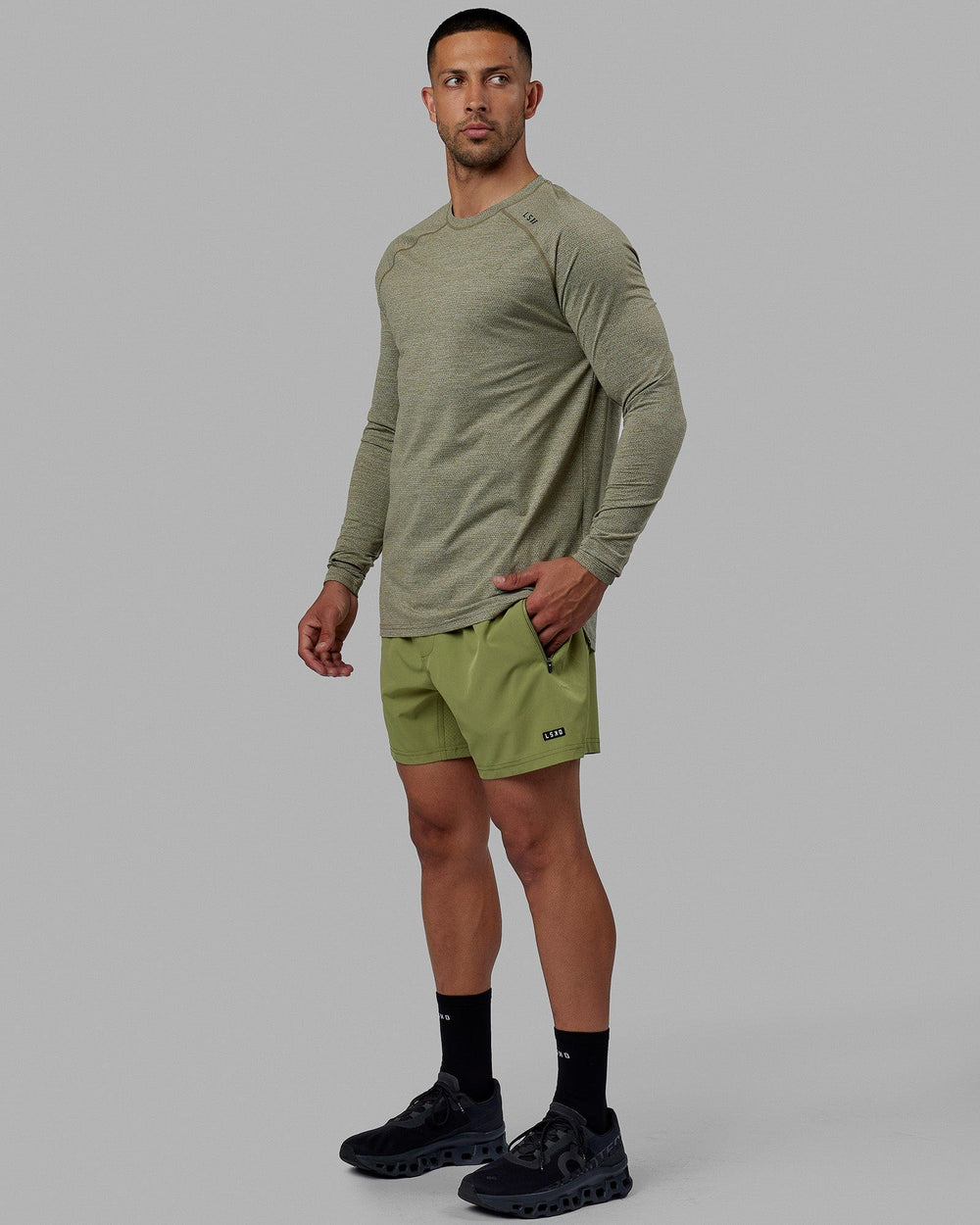 Man wearing Rep 5'' Performance Short - Moss Stone-Lime