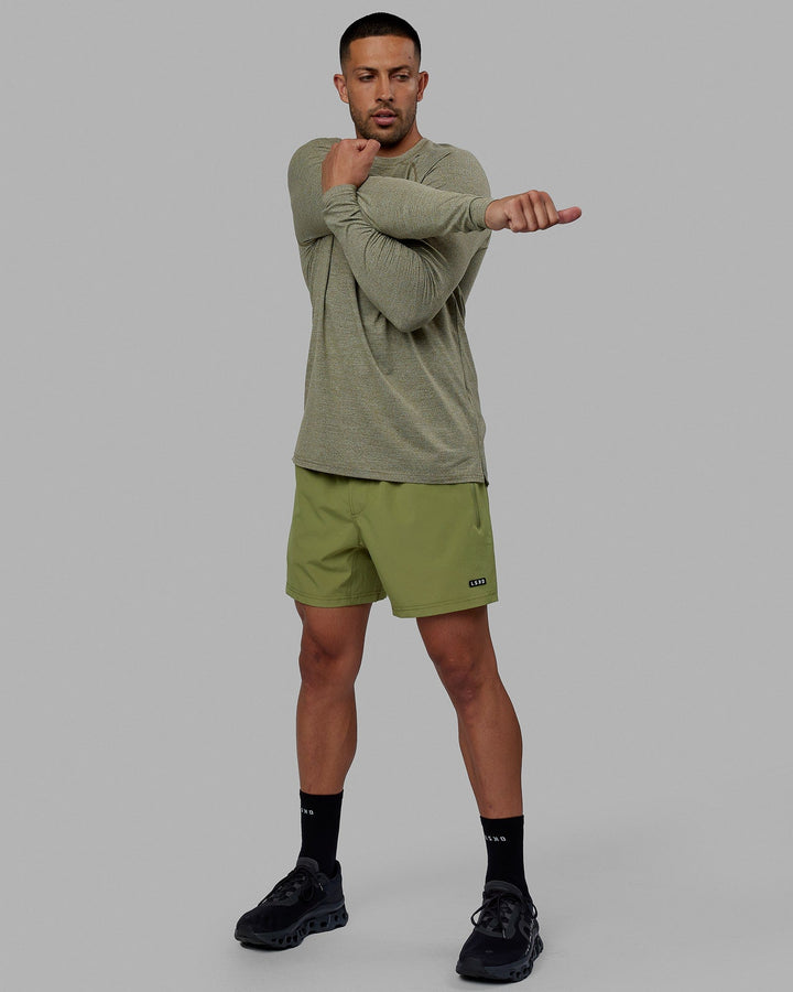 Man wearing Rep 5'' Performance Short - Moss Stone-Lime