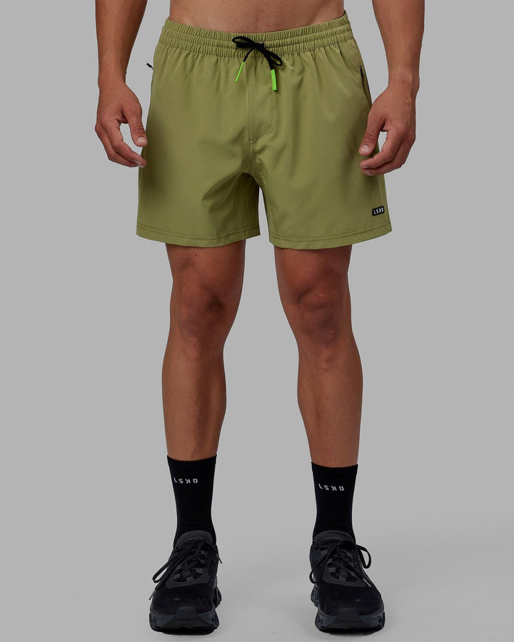 Man wearing Rep 5'' Performance Short - Moss Stone-Lime