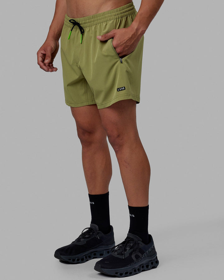 Man wearing Rep 5'' Performance Short - Moss Stone-Lime