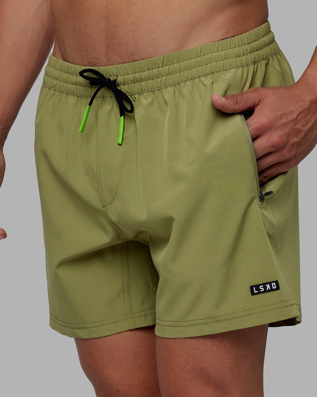 Man wearing Rep 5'' Performance Short - Moss Stone-Lime