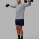 Man wearing Rep 5" Performance Short - Navy