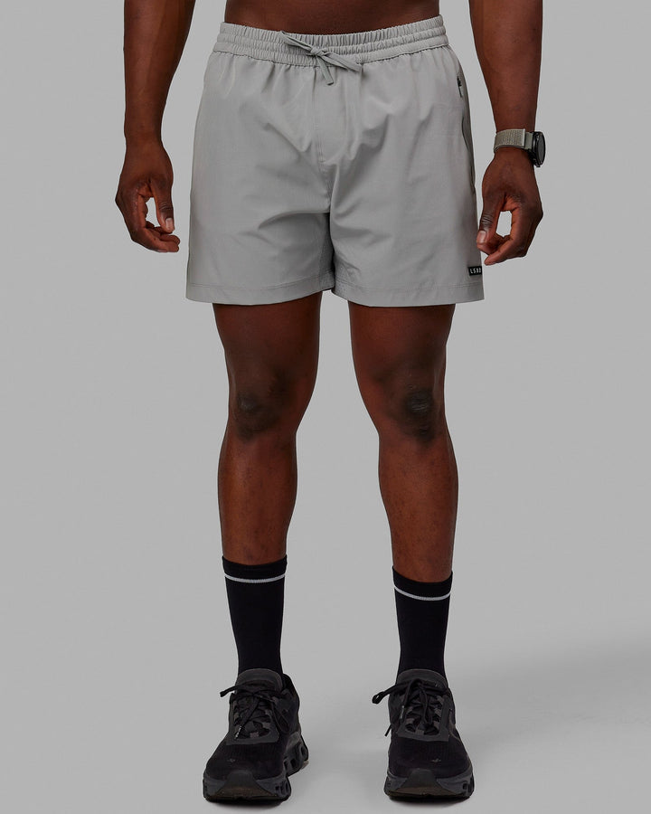 Man wearing Rep 5'' Performance Shorts - Ultimate Grey