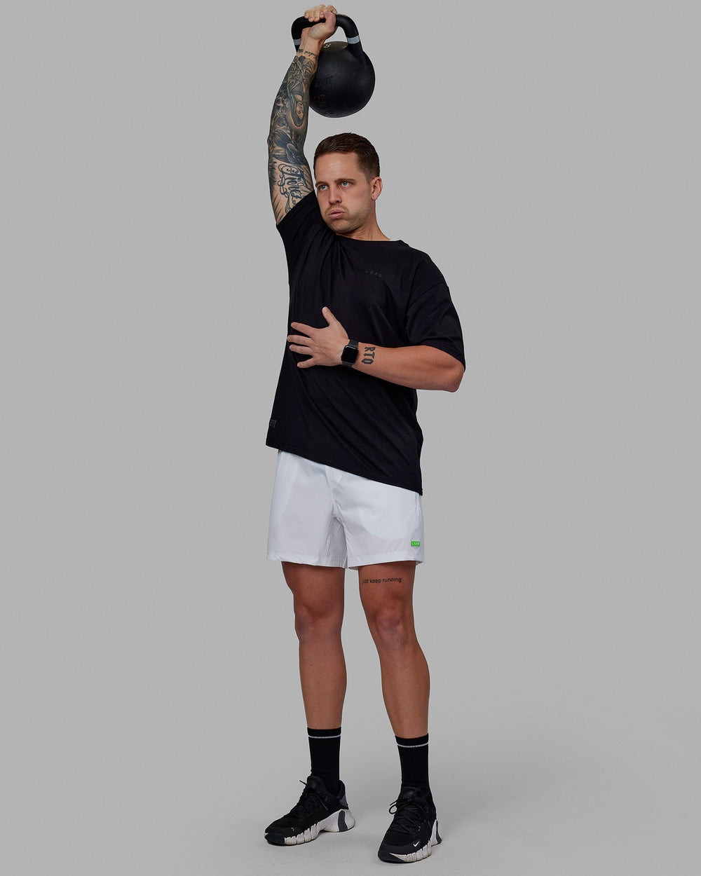 Man wearing Rep 5'' Performance Short - White-Lime