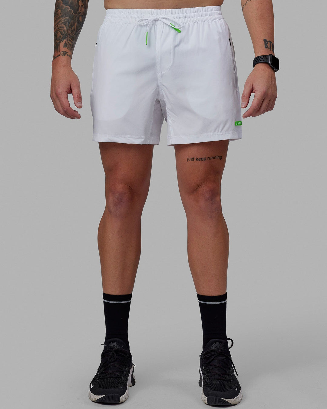 Man wearing Rep 5'' Performance Short - White-Lime