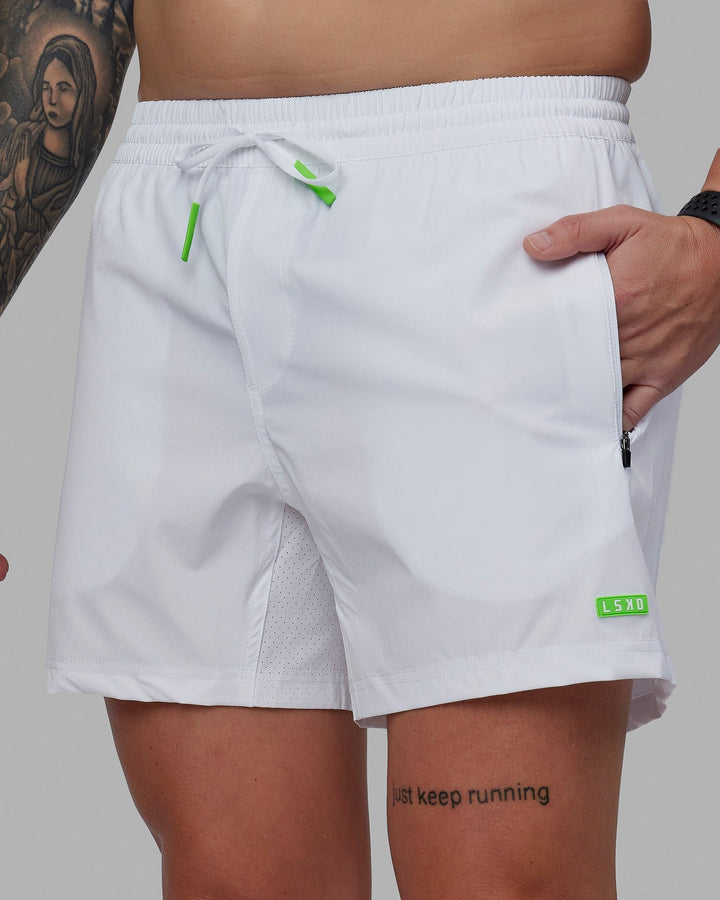 Man wearing Rep 5'' Performance Short - White-Lime