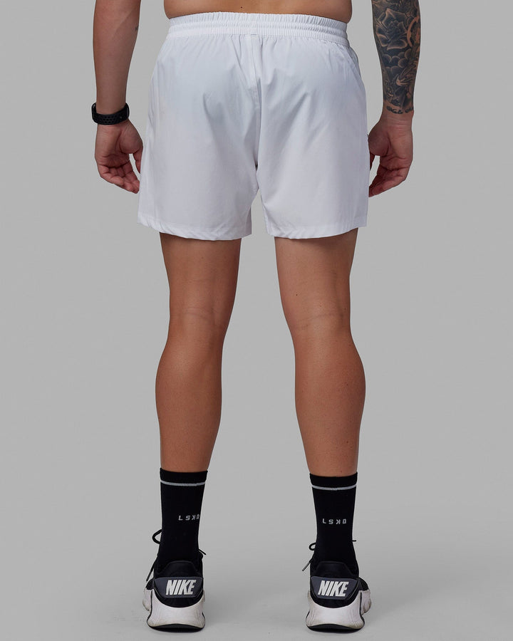 Man wearing Rep 5'' Performance Short - White-Lime