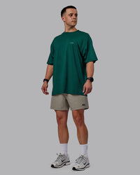 Man wearing Rep 5" Performance Shorts - Elephant