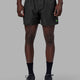 Man wearing Rep 5" Performance Short - Jungle Spot Print