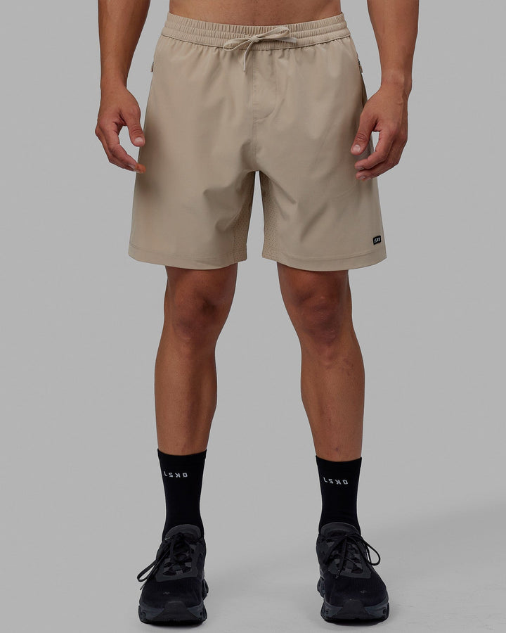 Man wearing Rep 7'' Performance Short - Taupe