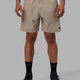 Man wearing Rep 7'' Performance Short - Taupe