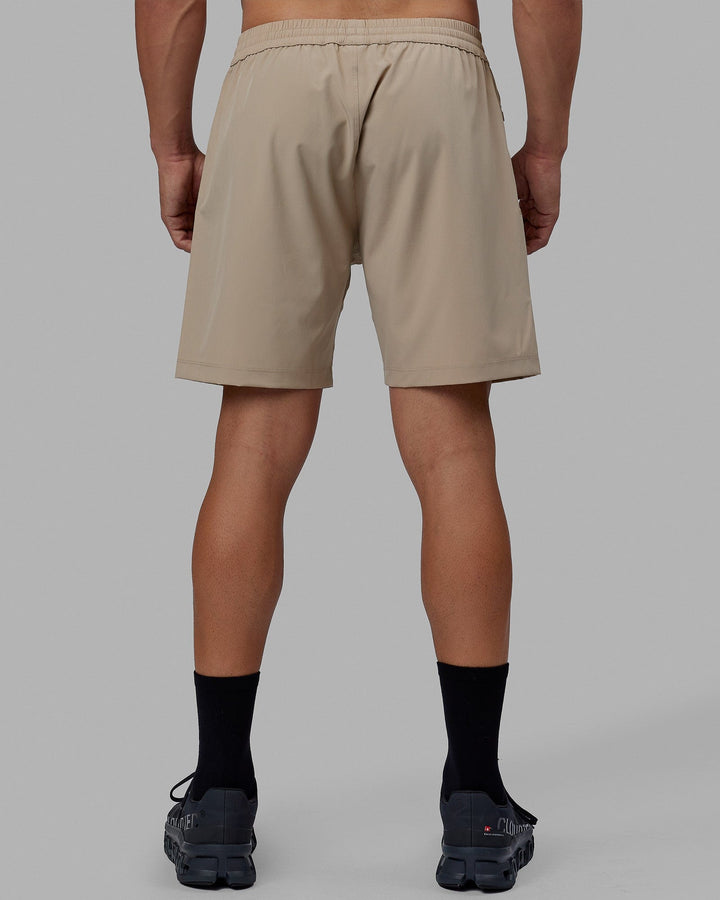 Man wearing Rep 7'' Performance Short - Taupe