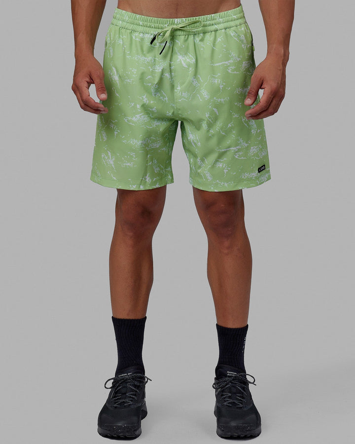 Man wearing Rep 7'' Performance Short - Terrain Green Fig