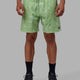 Man wearing Rep 7'' Performance Short - Terrain Green Fig