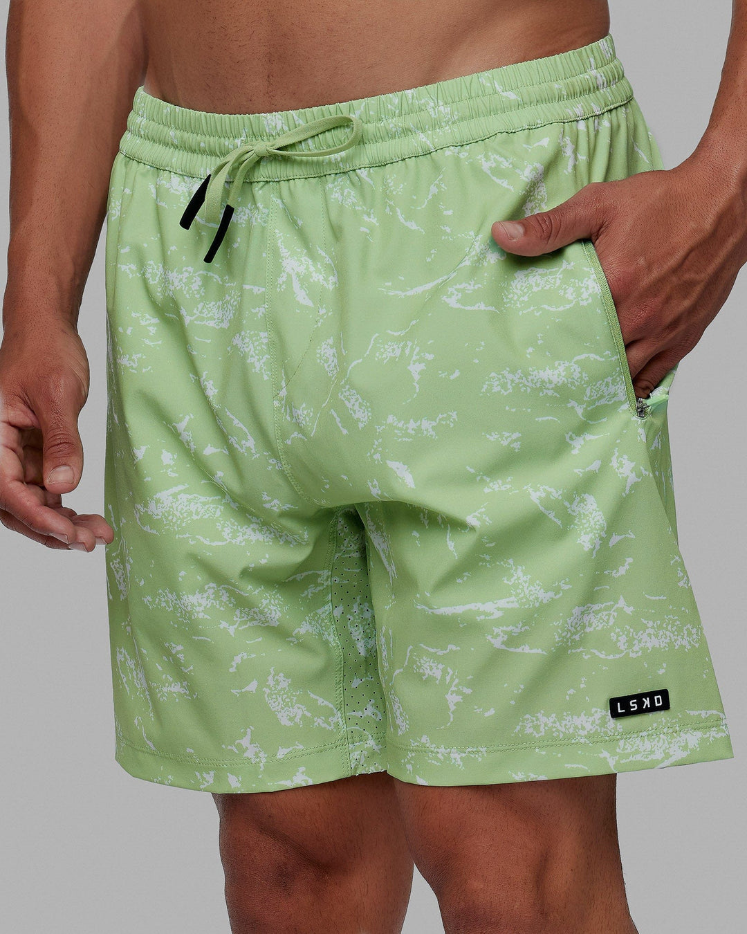 Man wearing Rep 7'' Performance Short - Terrain Green Fig