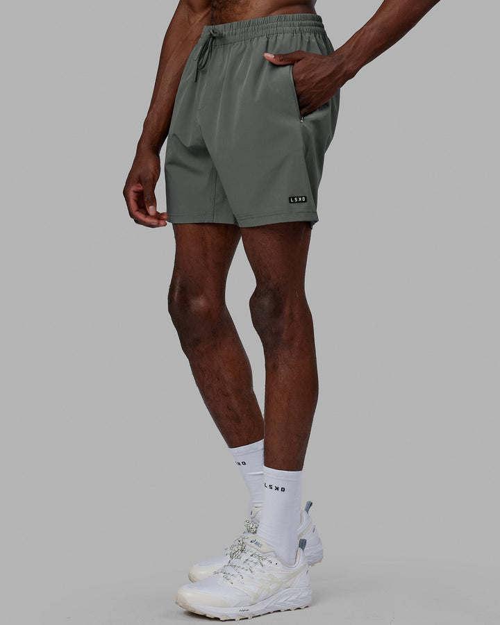 Man wearing Rep 7'' Performance Short - Graphite