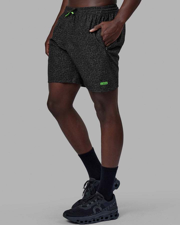 Woman wearing Rep 7'' Performance Short - Jungle Spot Print
