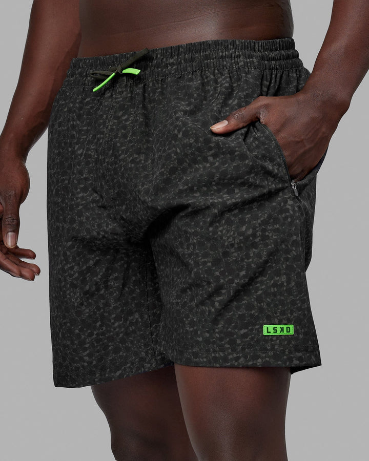 Woman wearing Rep 7'' Performance Short - Jungle Spot Print