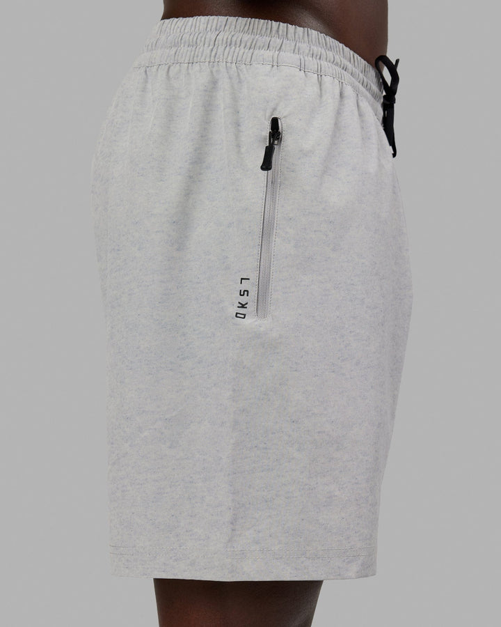Man wearing Rep 7" Performance Short - Light Grey Marl