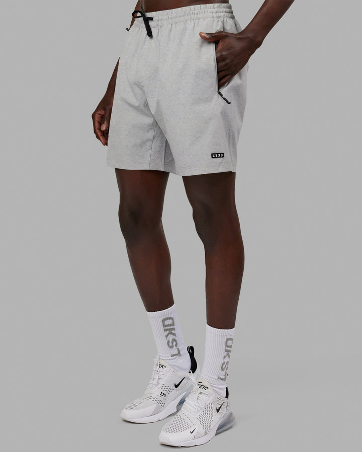 Man wearing Rep 7" Performance Short - Light Grey Marl