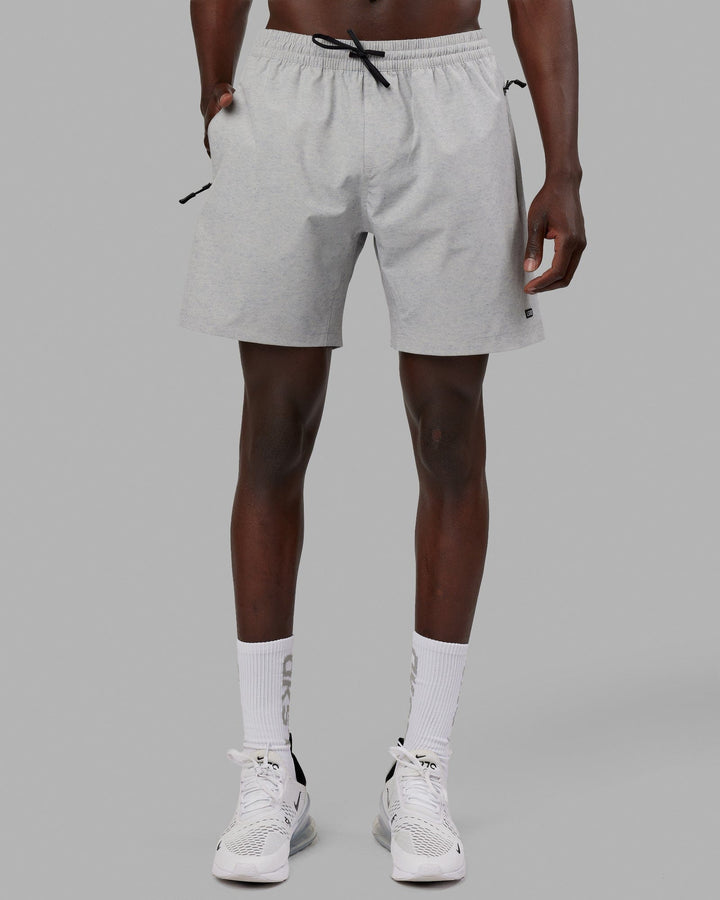 Man wearing Rep 7" Performance Short - Light Grey Marl