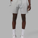 Man wearing Rep 7" Performance Short - Light Grey Marl