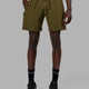 Man wearing Rep 7'' Performance Short - Olive