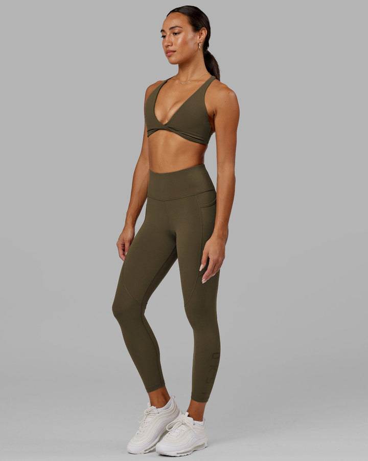 Woman wearing Rep 7/8 Length Tight - Army Green