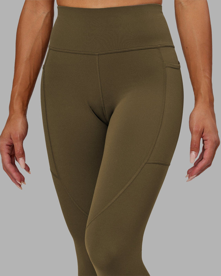 Woman wearing Rep 7/8 Length Tight - Army Green