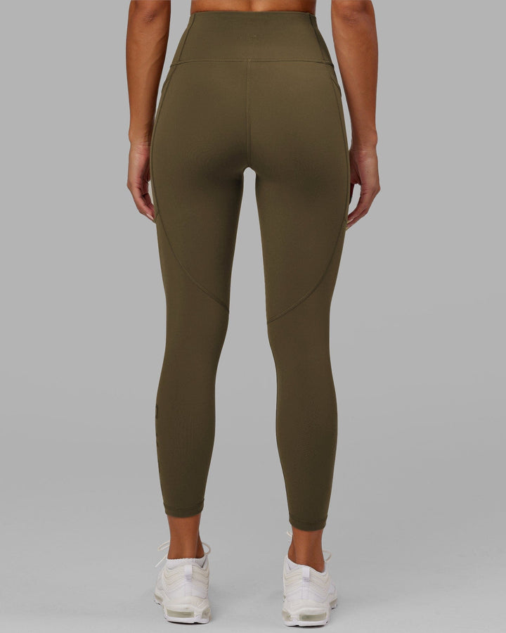 Woman wearing Rep 7/8 Length Tight - Army Green